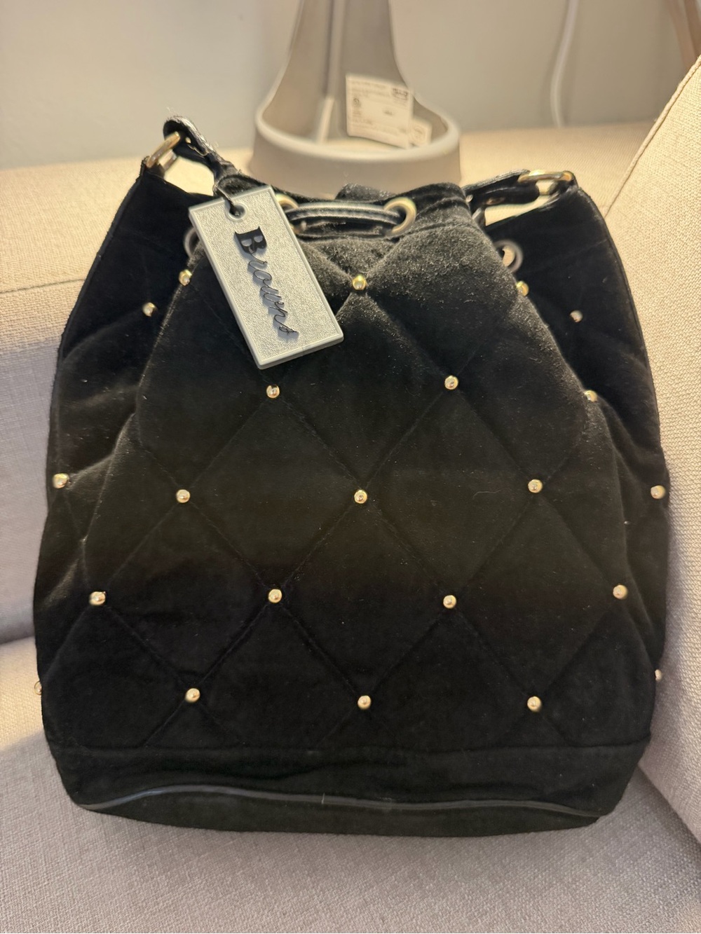 B. Smart Black Quilted Velvet Drawstring Bucket Bag with Gold Studs